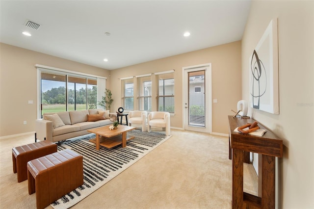 living room featuring light carpet