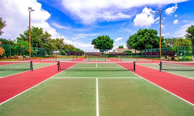 view of sport court featuring basketball hoop