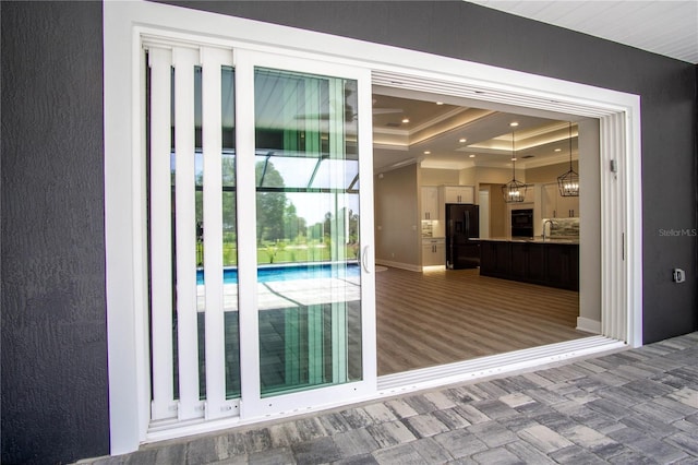 17694 SW 61st Lane Rd, Dunnellon, FL 34432 - doorway to property with an outdoor pool, stucco siding, and a sink