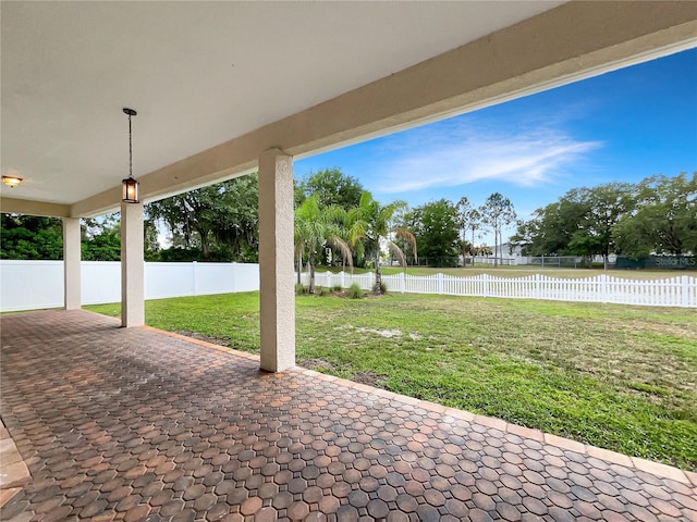 view of patio featuring a water view