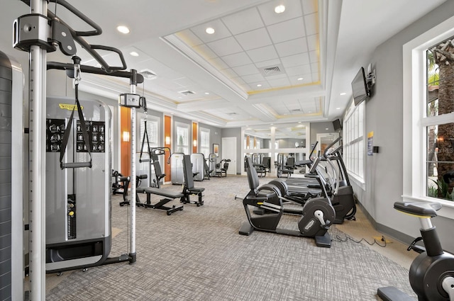 workout area with baseboards, visible vents, crown molding, and recessed lighting