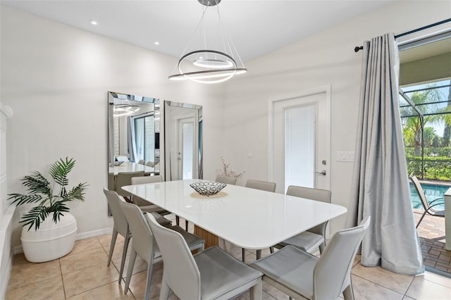 dining room featuring an inviting chandelier, recessed lighting, baseboards, and light tile patterned flooring