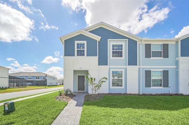 view of front of house with a front lawn