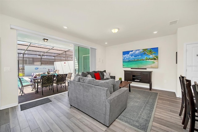 living room with wood-type flooring