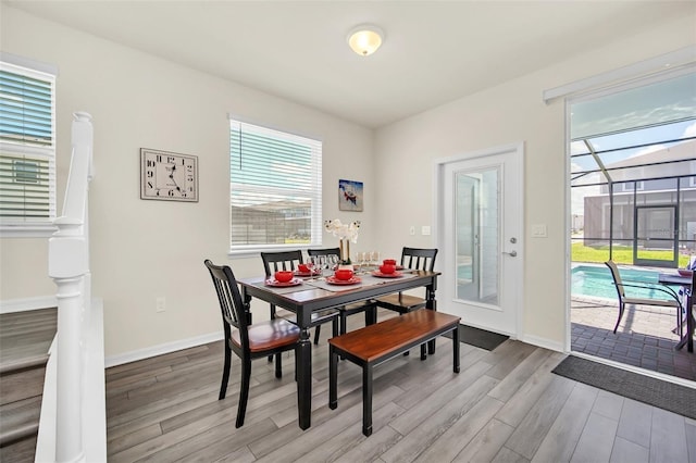 dining area with light wood-type flooring