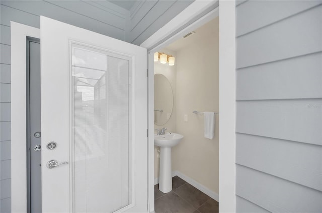 bathroom featuring tile patterned flooring