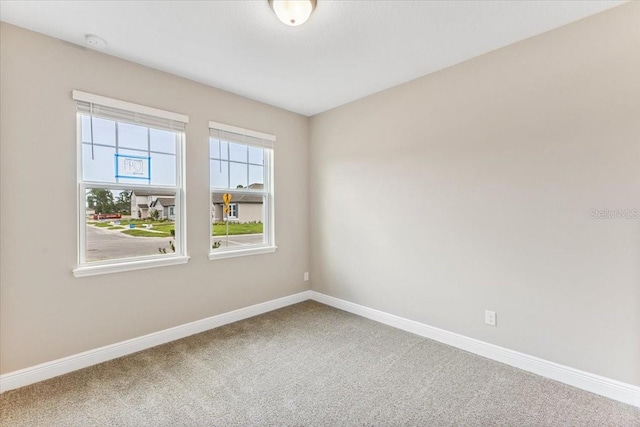 view of carpeted spare room