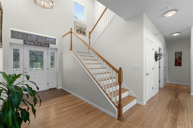 entrance foyer featuring light wood-type flooring and a wealth of natural light