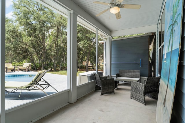 sunroom / solarium with ceiling fan