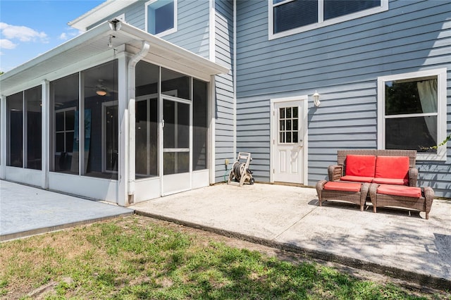 view of patio / terrace with a sunroom