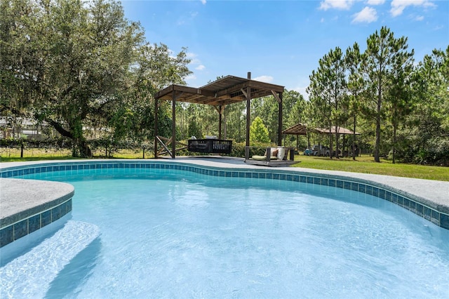 view of swimming pool with a gazebo