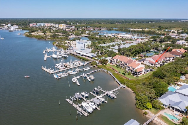 birds eye view of property featuring a water view