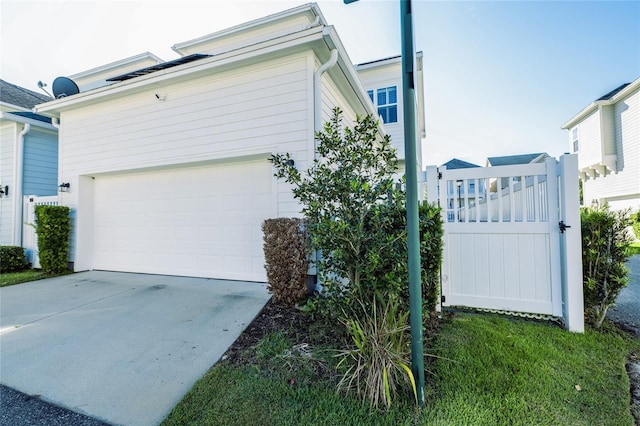 view of home's exterior with a garage