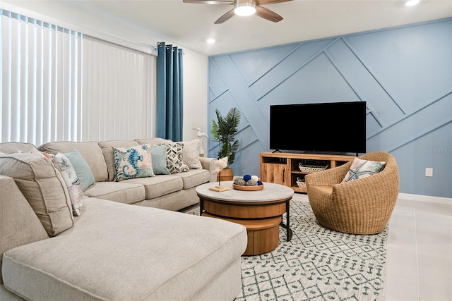 living room with tile floors and ceiling fan