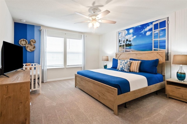 carpeted bedroom with ceiling fan