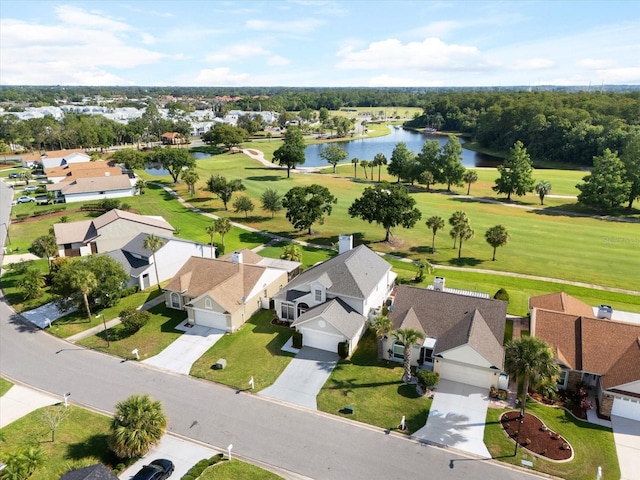 bird's eye view with a water view and a residential view