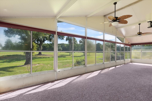 unfurnished sunroom with vaulted ceiling with beams and ceiling fan