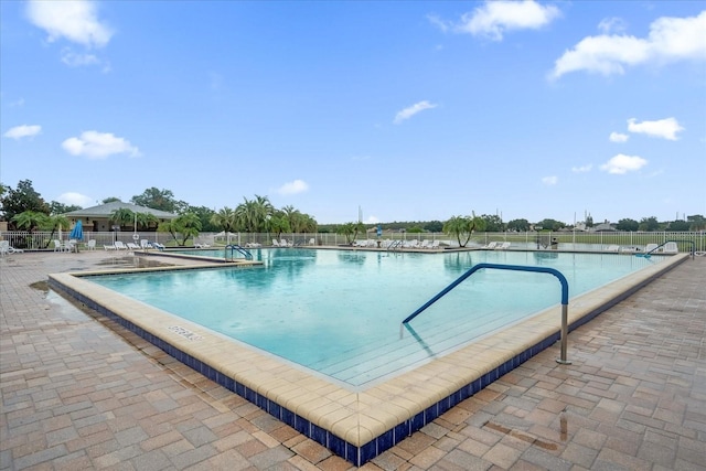 view of pool featuring a patio