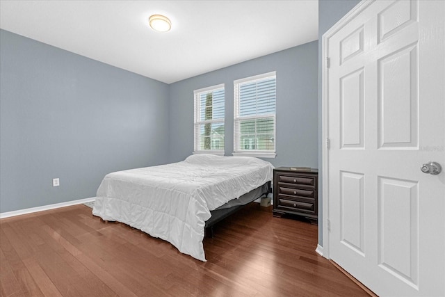 bedroom featuring hardwood / wood-style floors