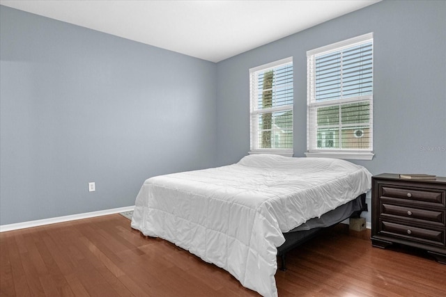 bedroom featuring wood-type flooring