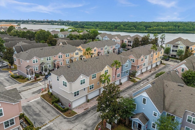 drone / aerial view with a water view