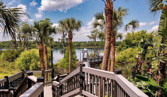 wooden deck with a water view