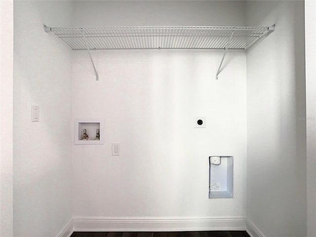 laundry area featuring hookup for an electric dryer, wood-type flooring, and washer hookup