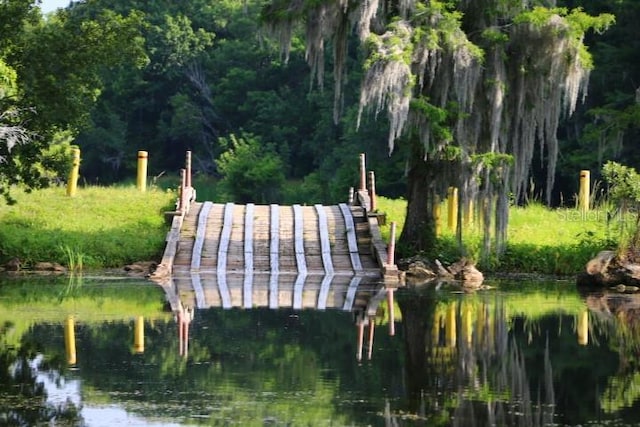 view of home's community featuring a water view