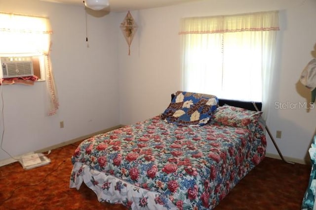 carpeted bedroom with cooling unit