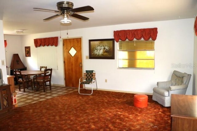 living room featuring ceiling fan