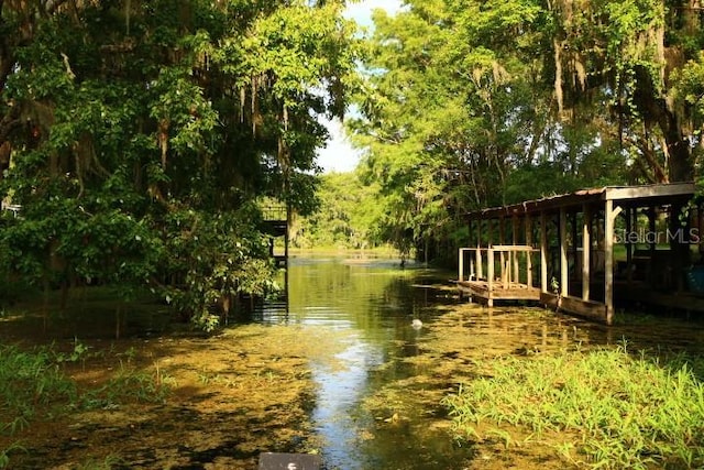 exterior space with a water view