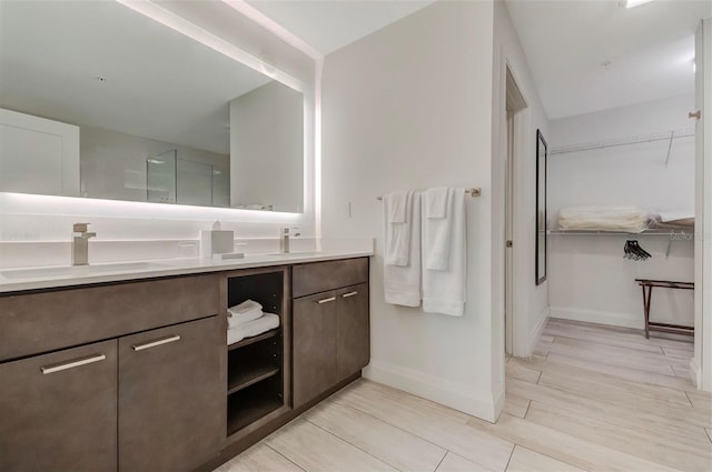 bathroom featuring double vanity