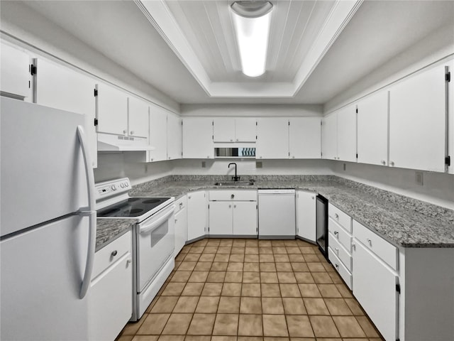 kitchen featuring white cabinets, white appliances, and sink