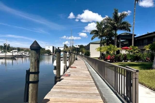 dock area featuring a water view