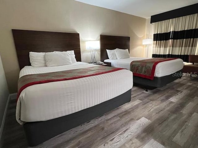 bedroom featuring hardwood / wood-style flooring