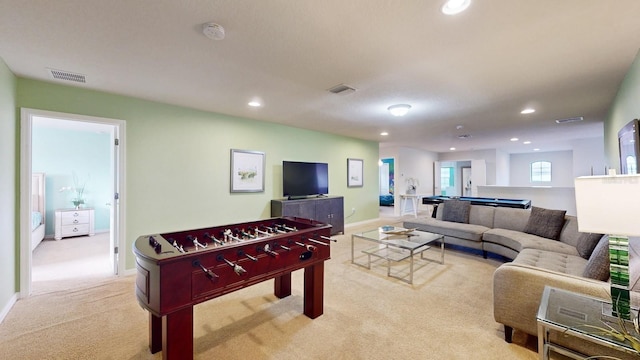 playroom featuring light colored carpet