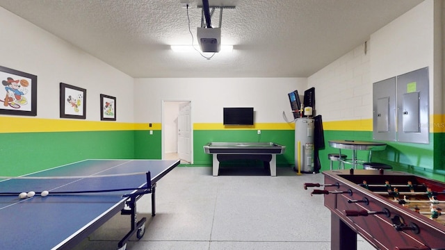 rec room with water heater and a textured ceiling