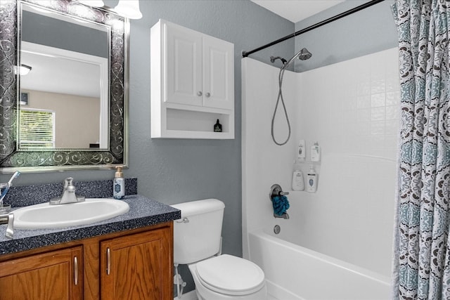 full bathroom featuring toilet, vanity, and shower / bath combo