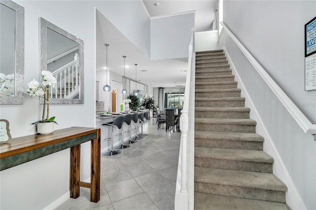 stairway featuring tile patterned floors