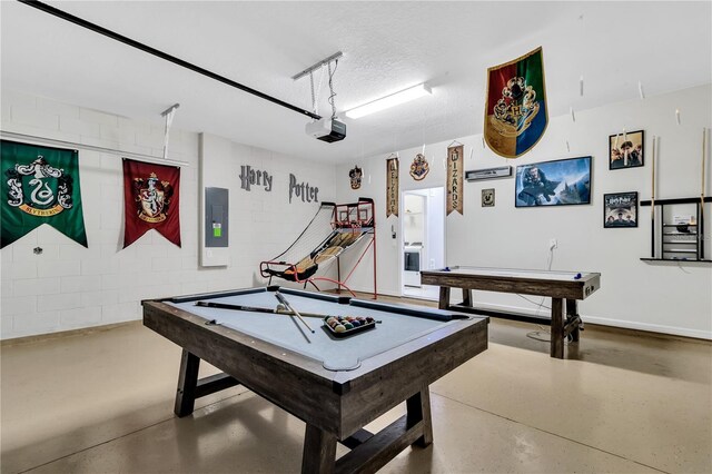 recreation room with billiards and concrete flooring