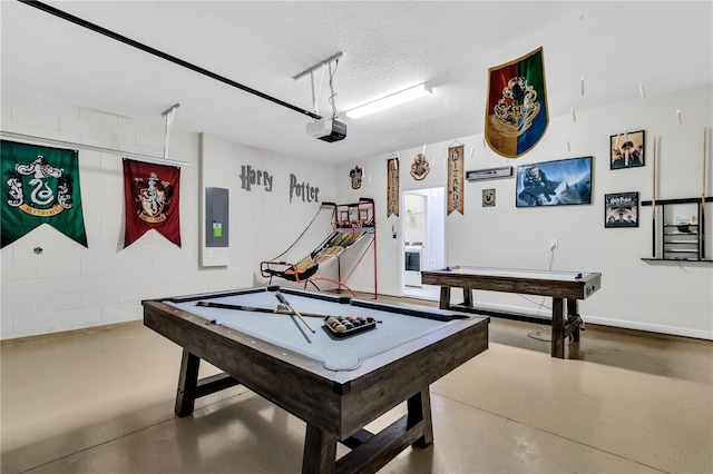 game room with billiards, electric panel, a textured ceiling, and concrete floors