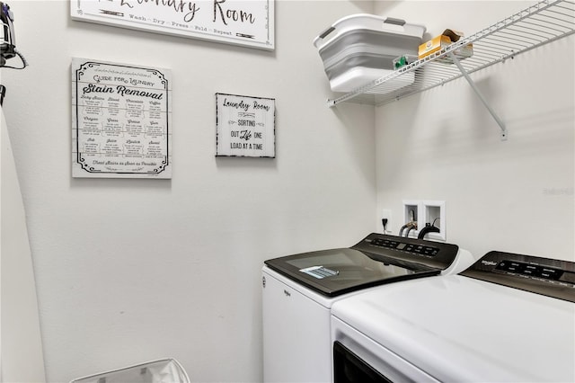 clothes washing area with hookup for a washing machine and washer and dryer