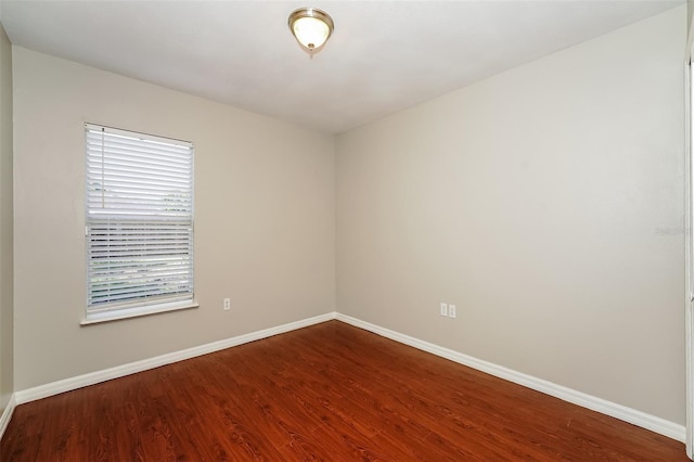 unfurnished room featuring hardwood / wood-style floors