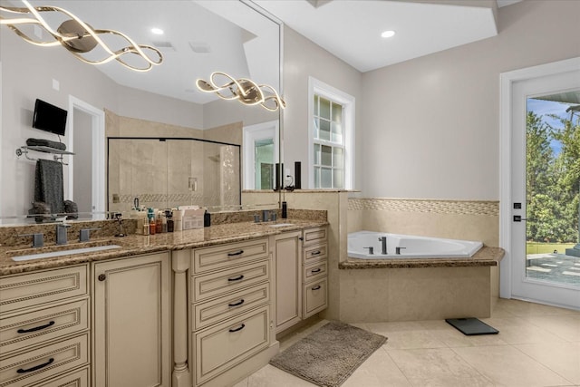 bathroom featuring vanity, tile patterned floors, and independent shower and bath