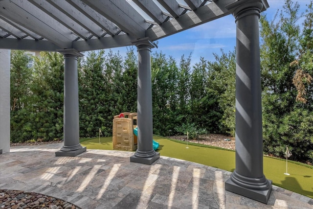 view of patio with a pergola and a playground