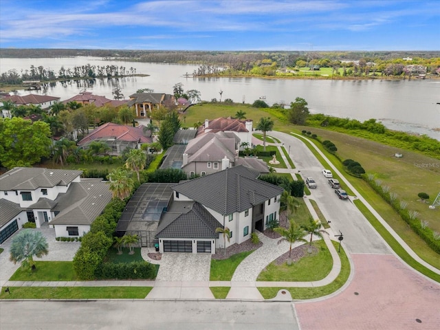 birds eye view of property featuring a water view