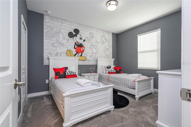 bedroom featuring dark colored carpet