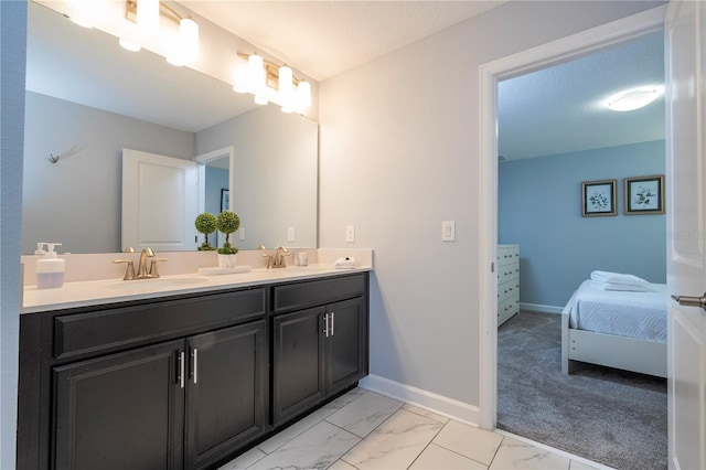 bathroom with vanity and a textured ceiling