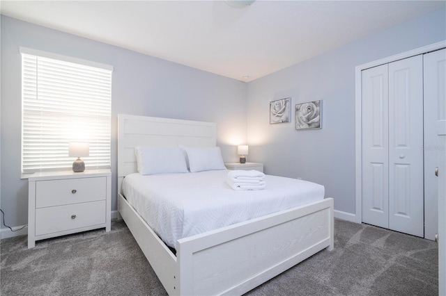 carpeted bedroom featuring a closet