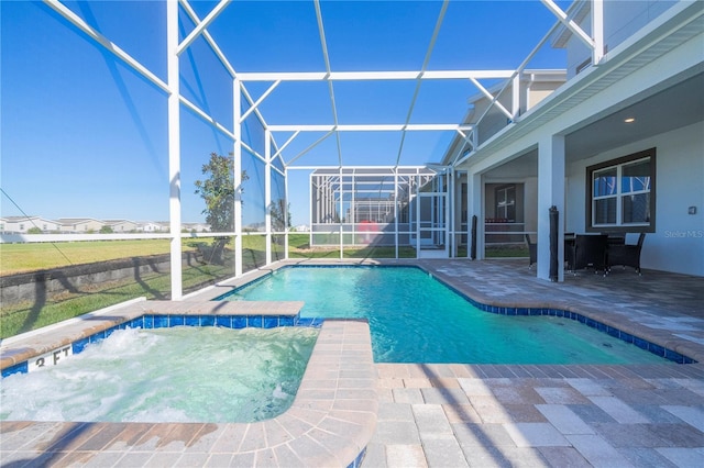 view of swimming pool featuring a lanai and a patio area